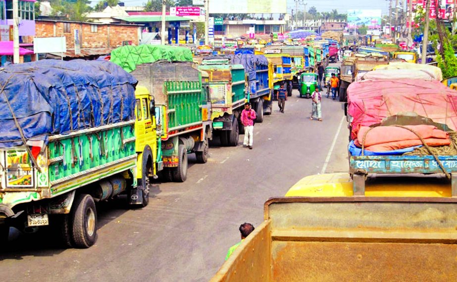 Truckersâ€™ continues their strike for the 3rd consecutive day yesterday for realising their 5-point demands creating massive traffic jam on Dhaka-Sylhet highway causing immense sufferings to commuters for several hours. This photo was taken from Sou