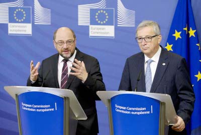 European Commission President Jean-Claude Juncker, right, and European Parliament President Martin Schultz participate in a media conference at EU headquarters in Brussels on Thursday.