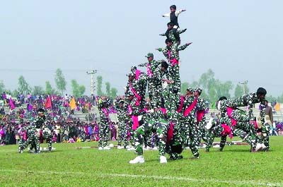 GAIBANDHA: Girls from Shishu Paribar displaying monument on the occasion of the Victory Day on Wednesday.