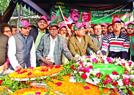 LGED Chief Engineer Shyama Prosad Adhikari along with other officials pays homage at the portrait of Father of the Nation Bangabandhu Sheikh Mujibur Rahman marking the Victory Day on Wednesday.