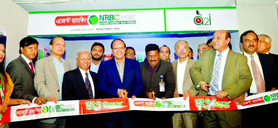 Bangladesh Bank Governor Dr Atiur Rahman, inaugurating the Agent Banking activities of NRB Commercial Bank Ltd, at a city hotel on Thursday.