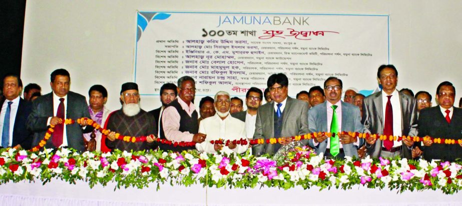 Karim UddinVarosha, Ex-Member of Parliament, Rangpur-4 inaugurating the 100th branch of Jamuna Bank Ltd at Pirgacha, Guabari, Rangpur on Thursday.
