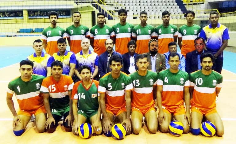 The members of the Iran-bound Bangladesh Volleyball team pose for a photograph at the Shaheed Suhrawardy Indoor Stadium in Mirpur on Saturday.