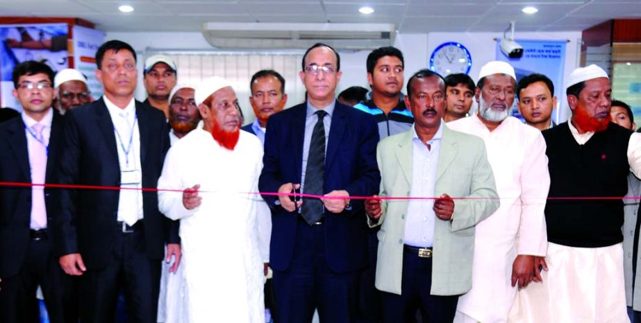 Md Sayedul Hasan, Deputy Managing Director of Dutch-Bangla Bank Ltd, inaugurating its 154th branch at Gopaldi, Narayanganj on Sunday.