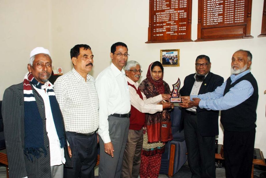 Md.Mokbul Ahmed ,General Manager(East) receiving a memento of Honors from Muktijudher Bijoy Mela Parisad for participation of the Victory Day rally brought out by the Parisad. Railway Sramik League leader freedom fighter Sheikh Lokman Hossain handed over
