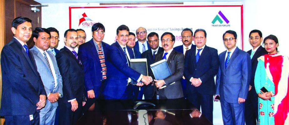 Faruq M Ahmed, Additional Managing Director of City Bank and Jalalul Azim, CEO of Pragati Life Insurance sign an agreement in the city recently. Under this agreement, 50-65 years old account holders will get the opportunity to enjoy life insurance facilit