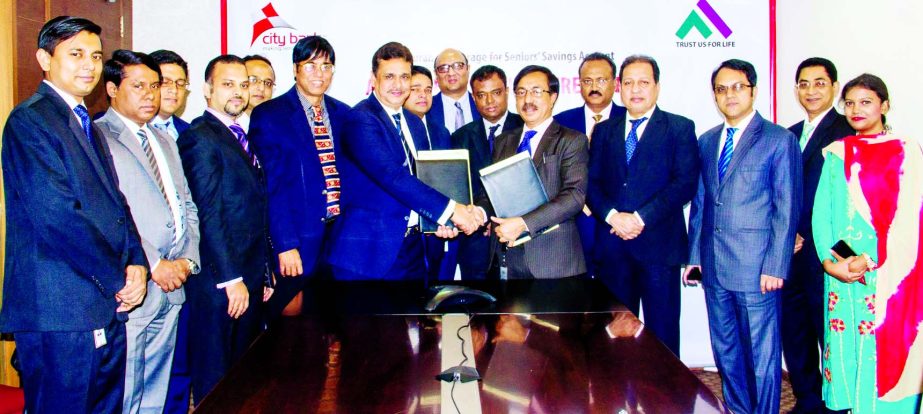 Faruq M Ahmed, Additional Managing Director of City Bank and Jalalul Azim, CEO of Pragati Life Insurance sign an agreement in the city recently. Under this agreement, 50-65 years old account holders will get the opportunity to enjoy life insurance facilit