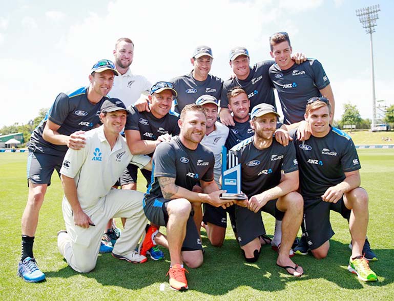 Players of New Zealand cricket team with the series trophy after a 2-0 swep on day four of the Second Test match against Sri Lanka at Seddon Park in Hamilton, New Zealand on Monday.