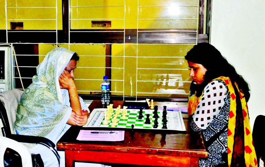 A secne from the fourth round games of Shamsher Ali Memorial Women's FIDE Rating Chess Tournament at Bangladesh Chess Federation hall-room on Monday.