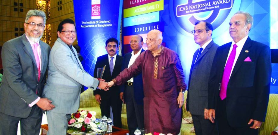 TH Forhad, Deputy Managing Director of Green Delta Insurance Company Limited, receiving the "ICAB National Award" first prize for Best Presented Annual Report in Insurance Category from Finance Minister A M A Muhith at a city hotel recently.