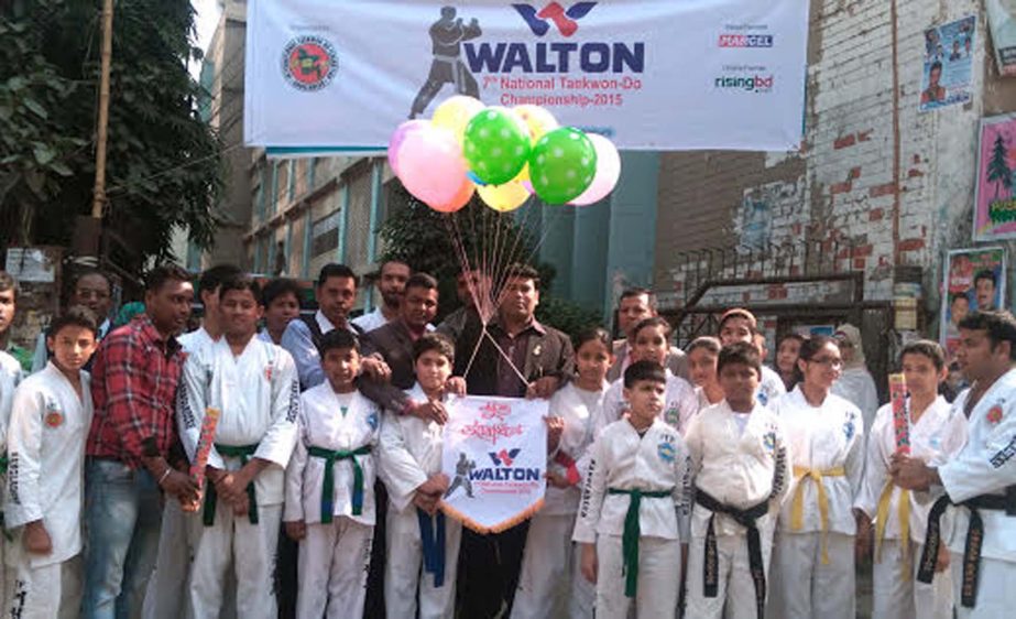 First Senior Additional Director of Walton FM Iqbal Bin Anwar Dawn and Senior AGM of Walton Mehrab Hossain Asif inaugurating the Walton 7th National Taekwondo Competition by releasing the balloons as chief guests at the premises of National Sports Council