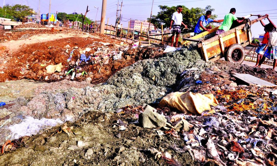 Huge chemical mixed waste of tanneries being dumped for months posing not only serious threat to environment but those have been blocked the Buriganga Channel. Authorities turned a blind eye. This photo was taken from Beribandh area on Tuesday.