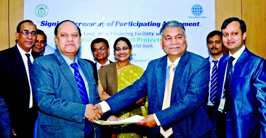 Md. Ahsan Ullah, Executive Director and Project Director of FSSP of Bangladesh Bank and KS Tabrez, Managing Director of Dutch-Bangla Bank sign agreement at the BB head office on Wednesday. Under this agreement DBBL can disburse low-cost long-term foreign