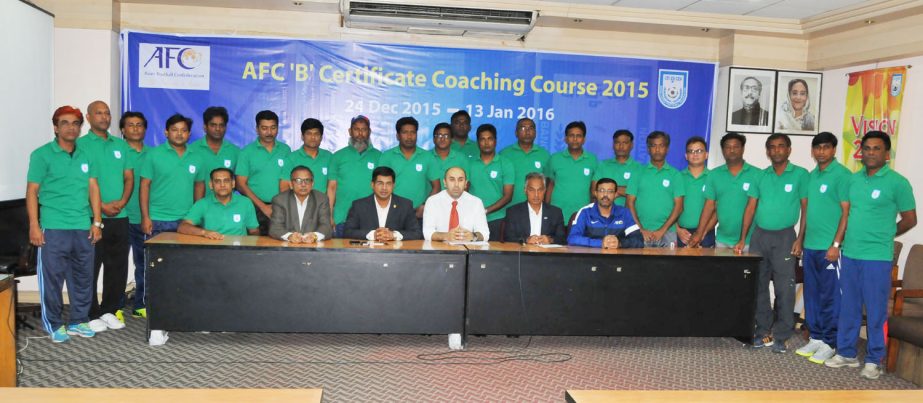 The participants of the karate referees' training workshop with the officials of Bangladesh Karate Federation pose for a photograph at the conference room of National Sports Council on Thursday.