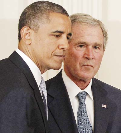 File photo shows President Barack Obama and former President George W. Bush take part in a ceremony in the East Room of the White House in Washington, to unveil the Bush portrait.