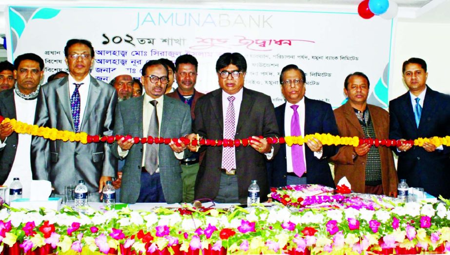 Al-Haj Md. Sirajul Islam Varosha, Chairman, Jamuna Bank Ltd. inaugurating its 102nd branch at Bhawanigonj, Rajshahi on Sunday.
