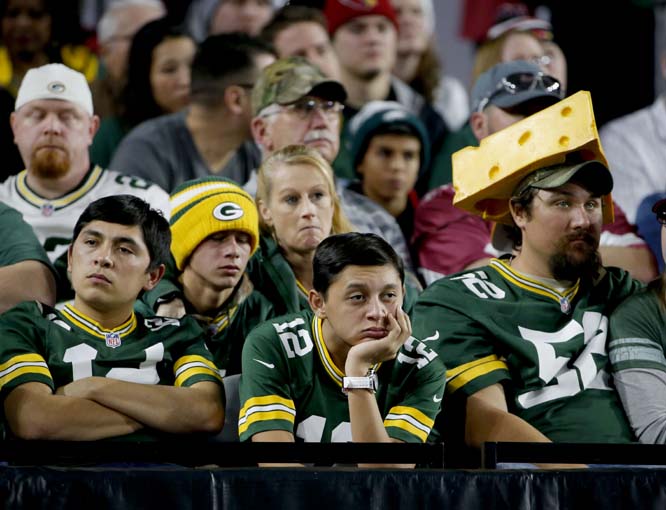 Green Bay Packers fans watch during the second half of an NFL football game against the Arizona Cardinals in Glendale, Ariz. The Cardinals won 38-8 on Sunday.