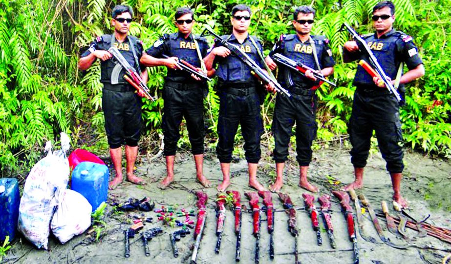 Huge arms and ammunition were recovered by RAB from Tambulbunia Khan area near the Sundarbans after the gunfight with Akash Babu Bahini on Sunday night.