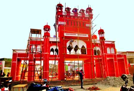 Preparations for holding Dhaka International Trade Fair (DITF) going on in full swing. This photo was snapped from Agargaon Fair premises on Monday.