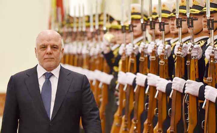 Iraq Prime Minister Haider al-Abadi inspecting guard of honour by army.