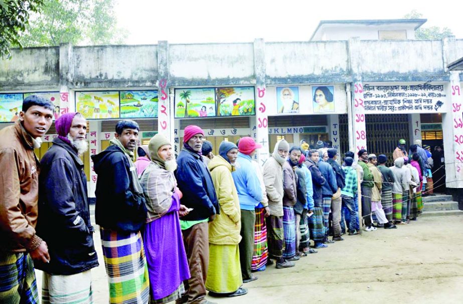 DINAJPUR: Voters are waiting at South Baluyadanga Govt Primary School centre to cast their vote yesterday.