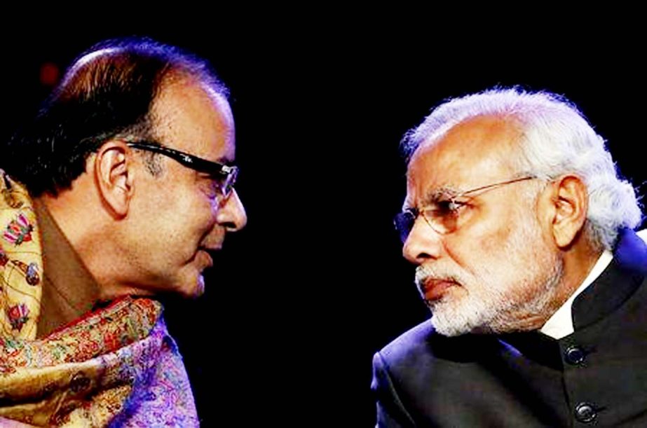 Indian Prime Minister Narendra Modi (R) listens to Finance Minister Arun Jaitley during the Global Business Summit in New Delhi, India.