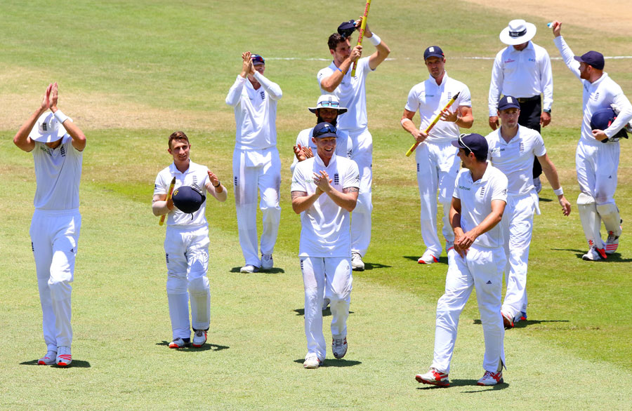 The England players celebrate their 241-run win over South Africa in 1st Test at Durban on Wednesday.
