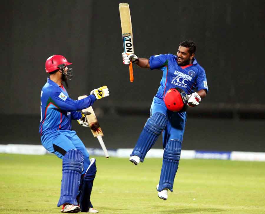 Mohammad Shahzad celebrates after Afghanistan's win over Zimbabwe in 2nd ODI at Sharjah on Tuesday.
