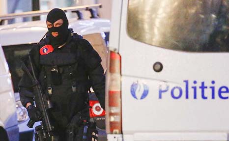 Belgian police seen at a combat mission in the Liege region city.