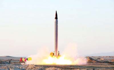 An Iranian Emad rocket is launched as it is tested at an undisclosed location