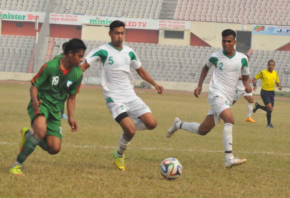A moment of the friendly football match between Bangladesh Under-23 National Football team and Bangladesh Army at the Bangabandhu National Stadium on Thursday. Bangladesh Under-23 National Football team won the match 1-0.