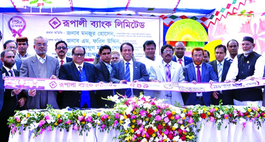 Monzur Hossain, Chairman of Rupali Bank Ltd, inaugurating its 549th branch at Nowpara of Monshigonj in Nawyapara recently. Managing Director of the bank M Farid Uddin was present special guest.