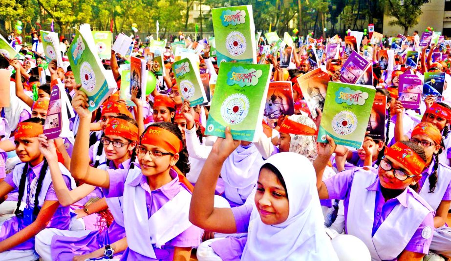 Students rejoicing a happy event after getting new books free of cost. This photo was taken from Govt Laboratory School in city on Friday.