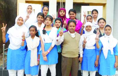 BARISAL: Jubilant students of Banaripara Girls' High School showing V-sign after achieving GPA-5 in JSC examination on Thursday.