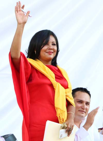 Gisela Mota waves during her swearing in ceremony as mayor of Temixco, Morelos State, Mexico.