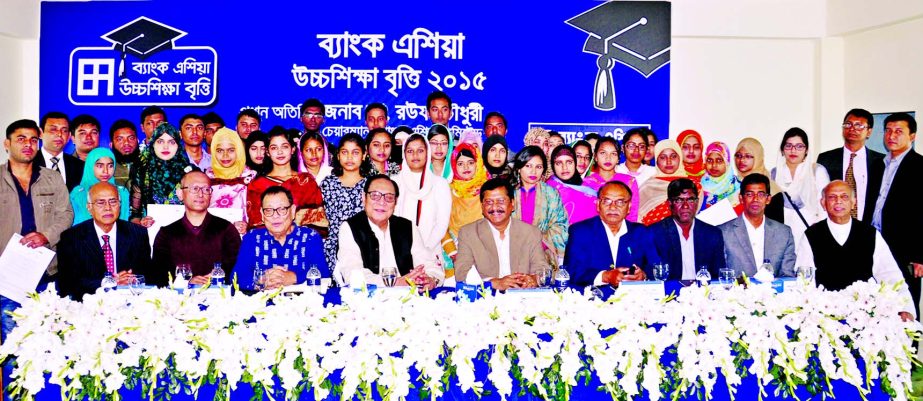 A Rouf Chowdhury, Chairman of Bank Asia, poses with the recipients of Bank Asia Higher Studies Scholarship at Malkhanagor College Hall room in Sirajdikhan Upazila, Munshigonj recently.