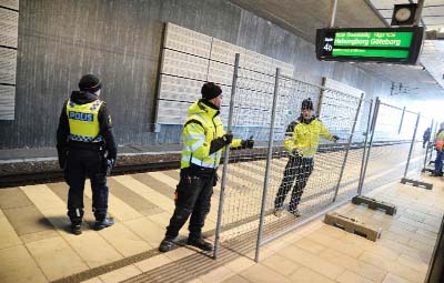 A temporary fence is erected between domestic and international tracks at Hyllie train station in southern Malmo, Sweden on Sunday.