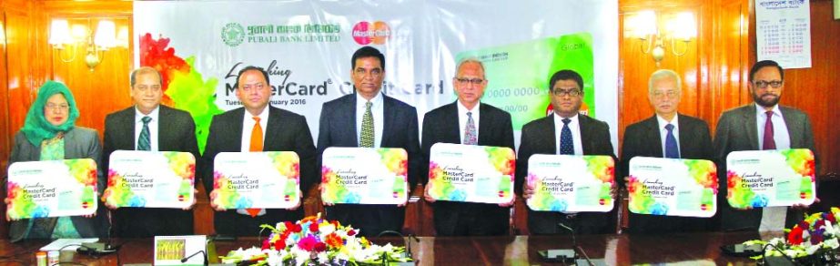 Md. Abdul Halim Chowdhury, Managing Director and Chief Executive Officer of Pubali Bank Limited poses at the inaugural ceremony of Master Card Credit Card in the city on Wednesday.