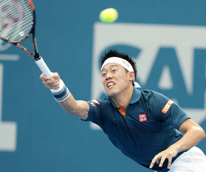 Kei Nishikori of Japan plays a shot in his match against Mikhail Kukushkin of Kazakhstan during the Brisbane International tennis tournament held in Brisbane, Australia on Wednesday.