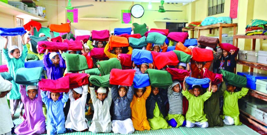 Bangladesh Association of Software and Information Services Vice -President M Rashidul Hasan distributed blankets among poor cold victims residing in Norshingdi and Sonargaon on Thursday.