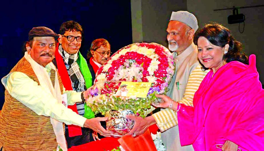 Chairman of Modern Herbal Dr Alamgir Moti along with others paid greetings to Poet Rafiqul Haque Dadubhai by giving flowers marking the latter's birth anniversary at Bangla Academy in the city on Friday.
