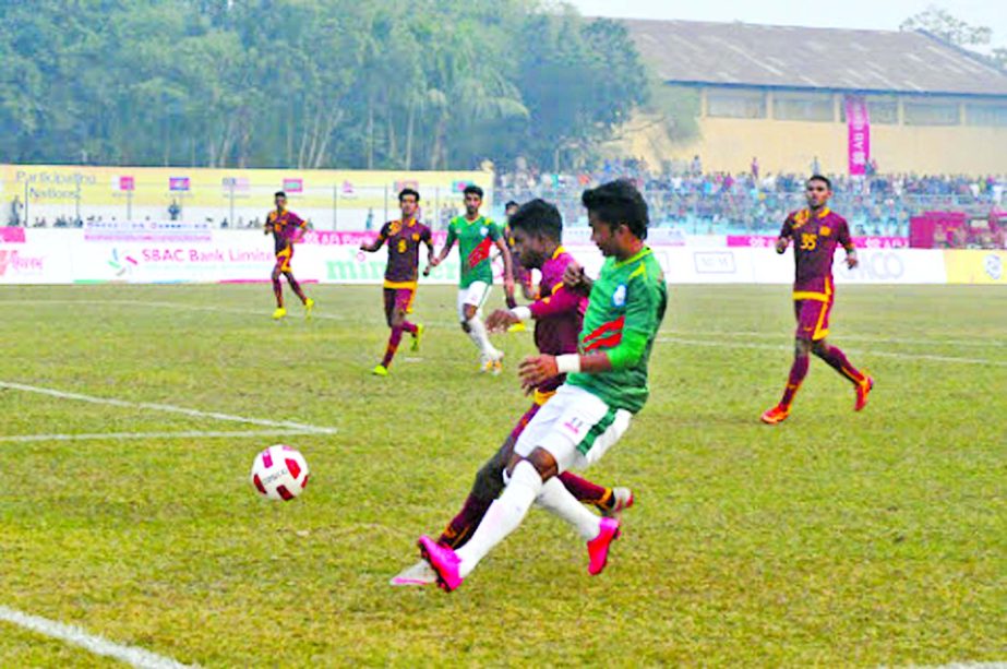 . A moment of the match of the 4th Bangabandhu Gold Cup International Football Tournament between Bangladesh and Sri Lanka at the Shams-Ul-Huda Stadium in Jessore on Friday.