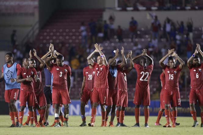 Panama's players greet fans after defeating Cuba, during a qualifying soccer playoff ahead of the Copa America Centenario in Panama City on Friday. Panama won the match 4-0.