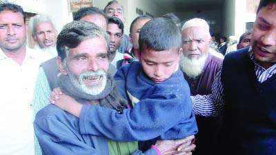 JhenaidAH: Seven-year old boy Sazib on his father's lap, leaving Jhenaidah court on Sunday.