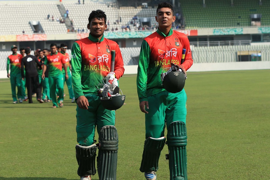 Nazmul Hossain Shanto and Saif Hassan of Bangladesh Under-19 Cricket team coming out from the field after beating West Indies in the first match of three-match Youth ODI series at Sher-e-Bangla National Cricket Stadium in Mirpur on Monday.