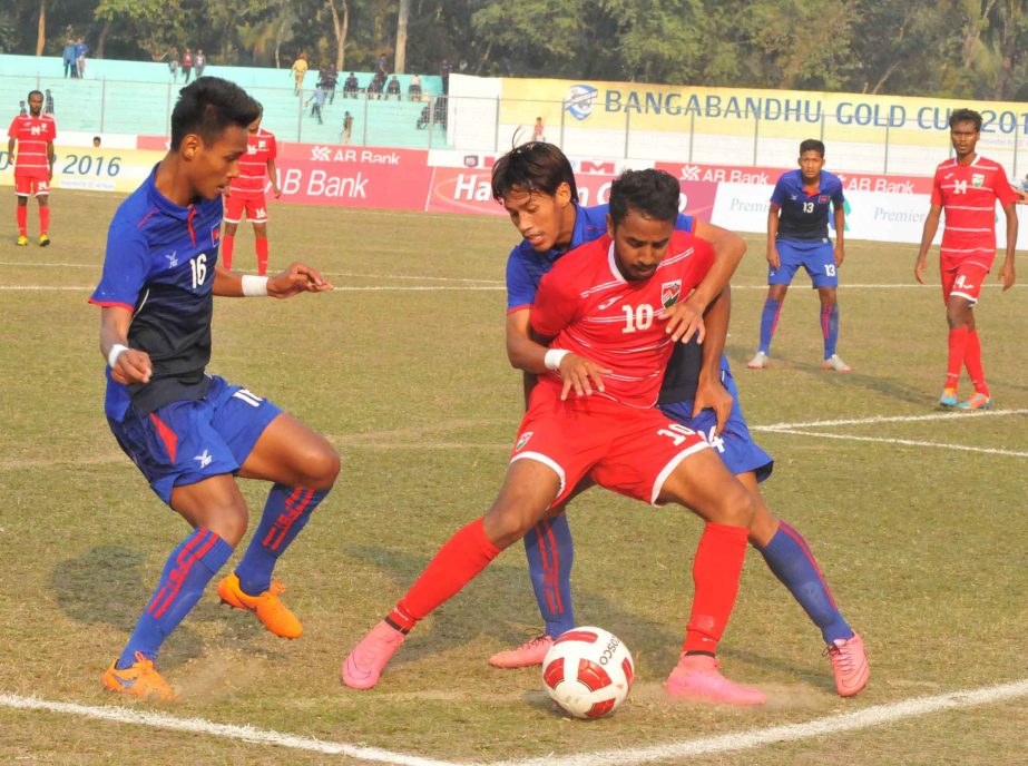 A moment of the Bangabandhu Gold Cup International Football Tournament between Maldives and Cambodia at the Shams-Ul-Huda Stadium in Jessore on Monday.