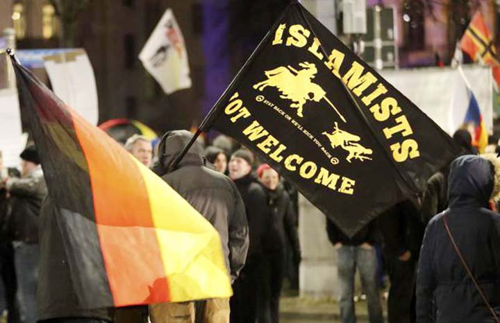 Members of LEGIDA, the Leipzig arm of the anti-Islam movement PEGIDA, take part in a rally in Leipzig, Germany on Monday.