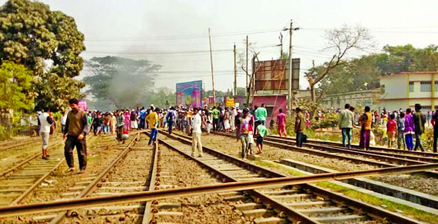 Angry Madrasah students uprooted railway lines of B'Baria station on Tuesday morning.