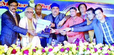 RAJSHAHI: Amaresh Ray Chowdhury, eminent musician unveiling cover of audio CD 'Anupomer Chokhey Jol' of Minhaj Dipon in a ceremony in Rajshahi on Tuesday.