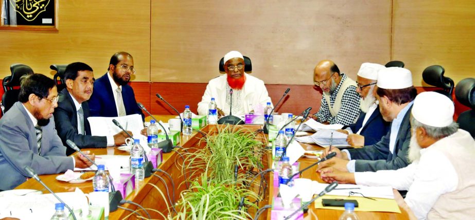 Abdul Malek Mollah, Chairman of the Executive Committee Meeting of the Board of Directors of Al-Arafah Islami Bank Limited, presiding over its 518th meeting at the bank's board room on Thursday.